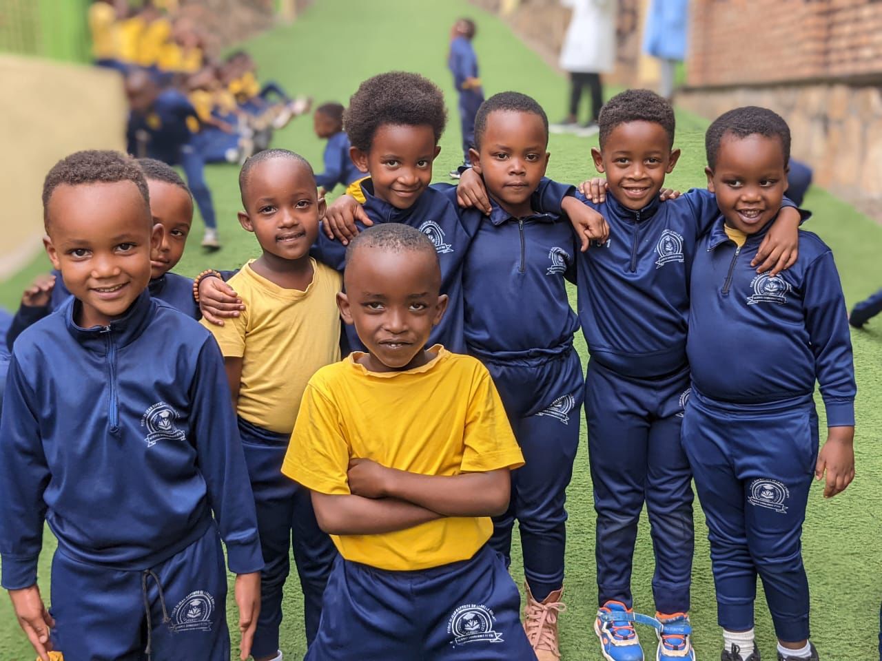 Children smiling on campus